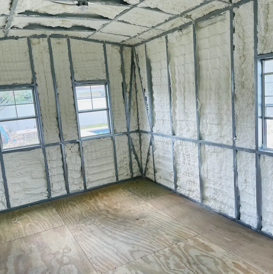 Closed-cell spray foam insulation applied to wall cavities in a residential project in Sparta